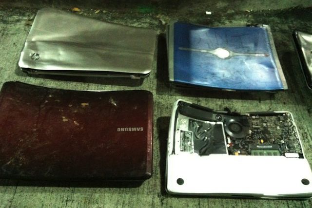 A photo of the broken laptops in the Sanitation depot, via Isaac Wilder / Motherboard